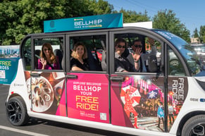 Passengers wave from a Bellevue Circuit