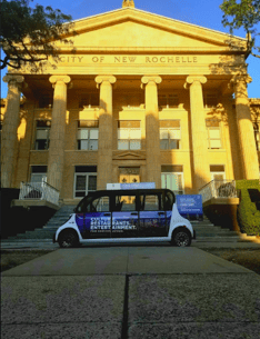 New Rochelle car in front of city hall