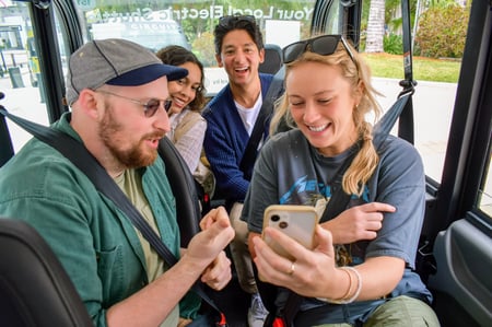 Riders looking at phone in vehicle 2023 Riders looking at phone in vehicle 2023